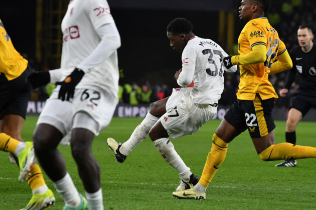 manchester-uniteds-kobbie-mainoo-centre-scores-his-sides-fourth-goal-during-the-english-premier-league-soccer-match-between-wolverhampton-wanderers-and-manchester-united-at-the-molineux-stadium-in