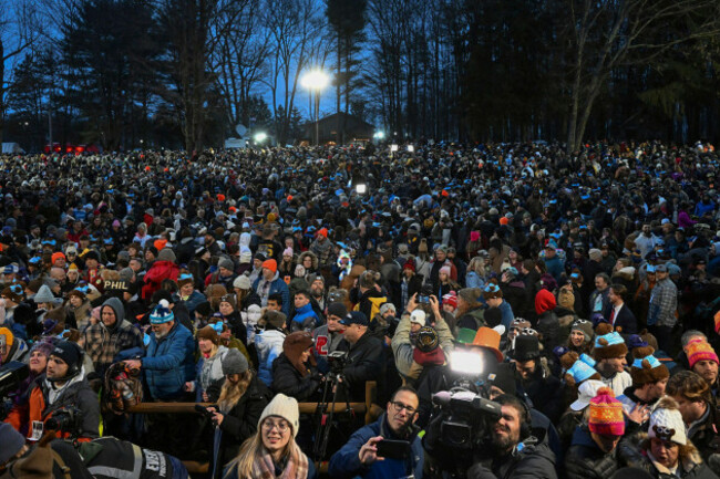 the-crowd-watches-the-festivities-while-waiting-for-punxsutawney-phil-the-weather-prognosticating-groundhog-to-come-out-and-make-his-prediction-during-the-138th-celebration-of-groundhog-day-on-gobbl