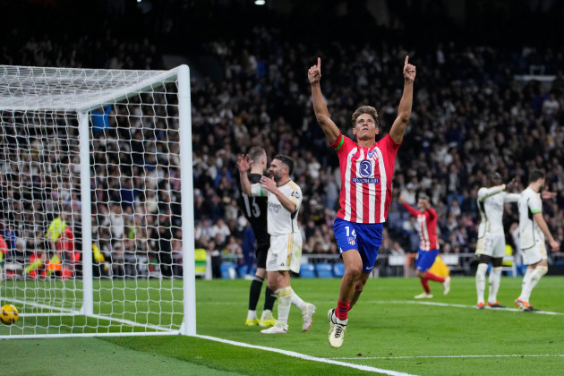 atletico-madrids-marcos-llorente-celebrates-after-scoring-his-sides-first-goal-during-the-spanish-la-liga-soccer-match-between-real-madrid-and-atletico-madrid-at-the-santiago-bernabeu-stadium-in-mad