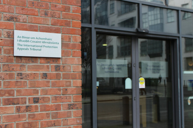 The entrance to the IPAT - a sign beside the sliding doors reads The International Protection Appeals Tribunal