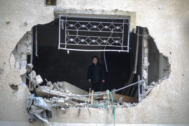 rafah-palestinian-territories-09th-feb-2024-a-palestinian-child-inspects-the-damage-and-rubble-of-destroyed-homes-following-israeli-airstrikes-on-several-homes-in-the-city-of-rafah-credit-mohamm