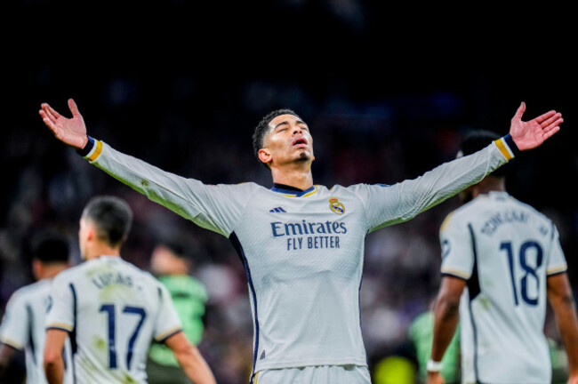 real-madrids-jude-bellingham-celebrates-after-scoring-his-sides-third-goal-during-a-spanish-la-liga-soccer-match-between-real-madrid-and-girona-at-the-santiago-bernabeu-stadium-in-madrid-spain-sat