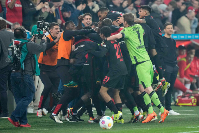leverkusen-players-celebrate-after-the-german-bundesliga-soccer-match-between-bayer-04-leverkusen-and-fc-bayern-munich-at-the-bayarena-in-leverkusen-germany-saturday-feb-10-2024-ap-photomartin
