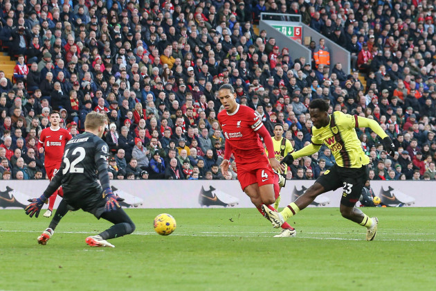 liverpool-uk-10th-feb-2024-datro-fofana-of-burnley-shoots-but-sees-his-effort-saved-by-caoimhin-kelleher-the-goalkeeper-of-liverpool-premier-league-match-liverpool-v-burnley-at-anfield-in-liver