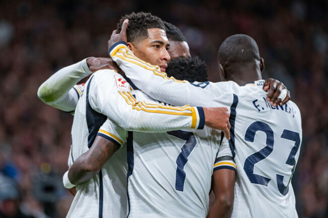 madrid-spain-10th-feb-2024-jude-bellingham-l-of-real-madrid-seen-celebrating-his-goal-with-vinicius-junior-c-and-ferland-mendy-r-of-real-madrid-during-the-la-liga-ea-sports-202324-football