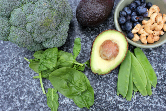 vegan-vegetarian-plant-based-diet-gluten-free-selection-of-cashew-nuts-blueberries-spinach-mange-tois-peas-avocado-and-broccoli-on-marble-and-board-background
