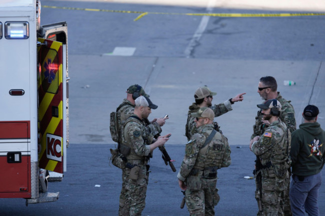 law-enforcement-officers-arrive-at-the-scene-after-an-incident-following-the-kansas-city-chiefs-victory-parade-in-kansas-city-mo-wednesday-feb-14-2024-the-chiefs-defeated-the-san-francisco-49er