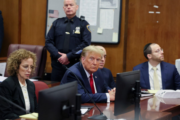 former-president-donald-trump-appears-during-a-court-hearing-at-manhattan-criminal-court-thursday-feb-15-2024-in-new-york-a-new-york-judge-says-trumps-hush-money-trial-will-go-ahead-as-schedule