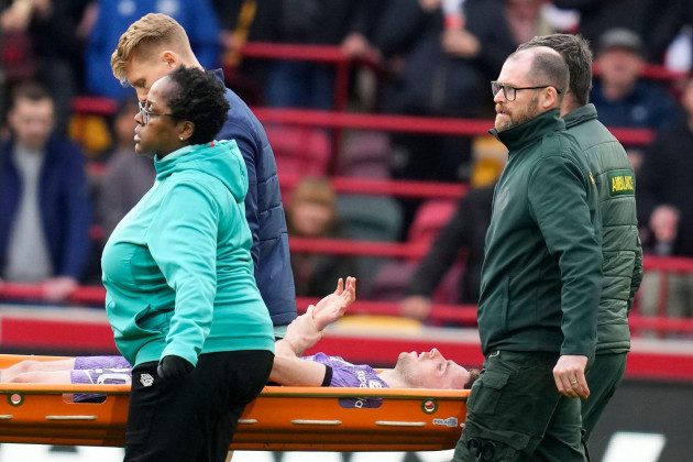 liverpools-diogo-jota-is-carried-off-the-pitch-on-a-stretcher-after-getting-injured-during-the-english-premier-league-soccer-match-between-brentford-and-liverpool-at-the-gtech-community-stadium-in-lo