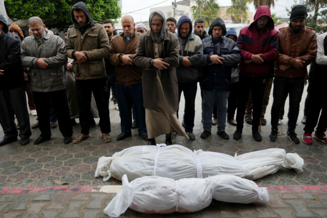 palestinians-pray-for-the-relatives-killed-in-the-israeli-bombardments-of-the-gaza-strip-in-front-of-the-morgue-at-al-aqsa-hospital-in-deir-al-balah-gaza-strip-on-sunday-feb-18-2024-ap-photoad