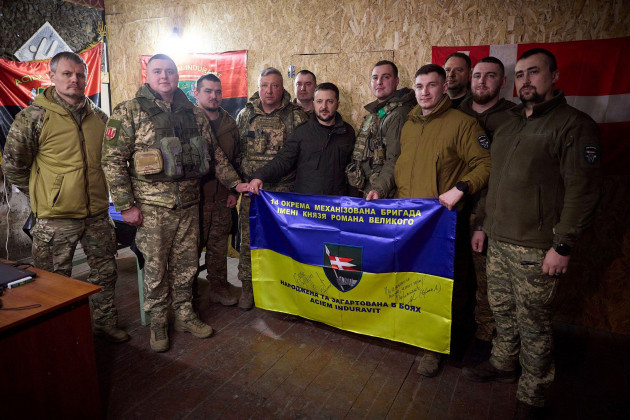 in-this-photo-provided-by-the-ukrainian-presidential-press-office-ukrainian-president-volodymyr-zelenskyy-center-poses-for-a-photo-with-soldiers-during-his-visit-to-the-front-line-city-of-kupiansk