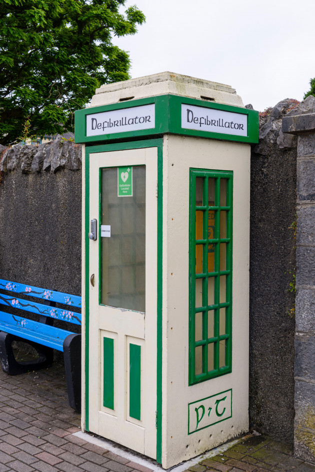 old-irish-telephone-box-which-has-been-converted-into-a-safe-storage-location-for-a-defibrillator