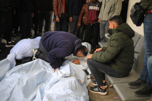 rafah-palestinian-territories-18th-feb-2024-a-man-griefs-next-to-the-dead-bodies-of-palestinians-killed-in-israeli-bombardment-on-lands-housing-displaced-persons-in-al-najjar-hospital-credit-m