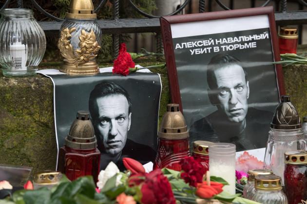 gdansk-poland-22-february-2024-mourners-lay-flowers-and-candles-outside-the-russian-consulate-in-gdansk-to-conmemorate-opposition-leader-alexei-navalny-after-confirmation-of-his-death-by-prison-aut