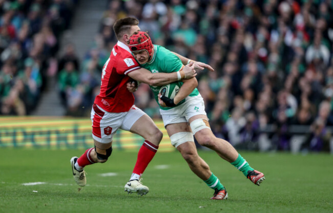 josh-van-der-flier-is-tackled-by-josh-adams