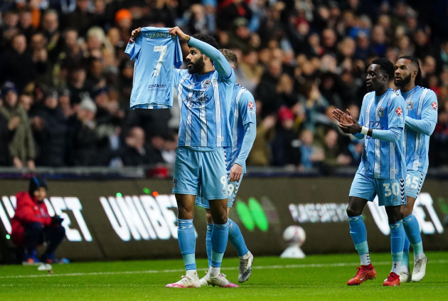 coventry-citys-ellis-simms-celebrates-scoring-their-sides-first-goal-of-the-game-by-holding-up-a-shirt-of-injured-team-mate-tatsuhiro-sakamoto-during-the-emirates-fa-cup-fifth-round-match-at-the-cov