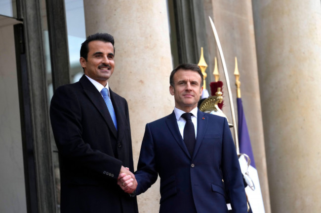 french-president-emmanuel-macron-right-welcomes-qatars-emir-sheikh-tamim-bin-hamad-al-thani-at-the-elysee-palace-in-paris-tuesday-feb-27-2024-qatars-emir-starts-on-tuesday-a-state-visit-to-fr