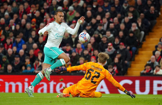liverpool-goalkeeper-caoimhin-kelleher-saves-from-southamptons-sekou-mara-during-the-emirates-fa-cup-fifth-round-match-at-anfield-liverpool-picture-date-wednesday-february-28-2024