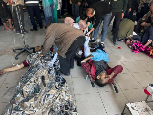 palestinians-wounded-in-an-israeli-strike-while-waiting-for-humanitarian-aid-on-the-beach-in-gaza-city-are-treated-in-shifa-hospital-on-thursday-feb-29-2024-ap-photomahmoud-essa