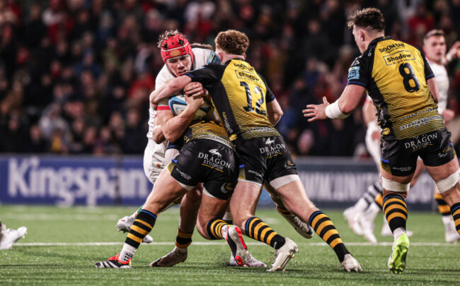 jude-postlethwaite-is-tackled-by-will-reed-and-aneurin-owen