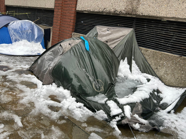 tents-some-flooded-and-collapsed-used-by-migrants-and-other-people-experiencing-homeless-outside-the-international-protection-office-during-a-period-of-snow-in-dublin-the-irish-weather-agency-met-e