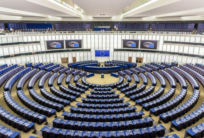 general-view-of-the-hemicycle-of-the-european-parliament-in-brussels-belgium-with-the-flag-of-the-european-union-above-the-desk-of-the-president