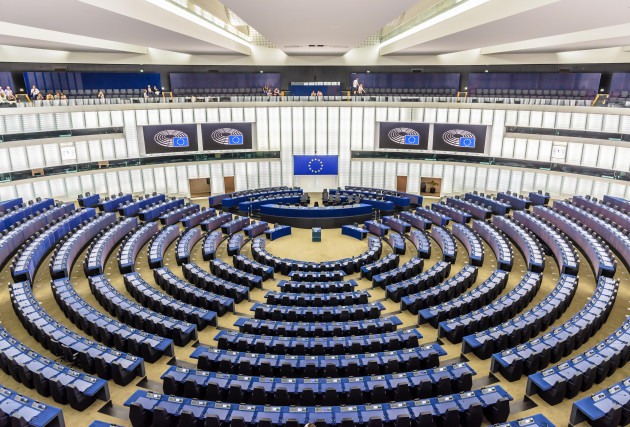 general-view-of-the-hemicycle-of-the-european-parliament-in-brussels-belgium-with-the-flag-of-the-european-union-above-the-desk-of-the-president