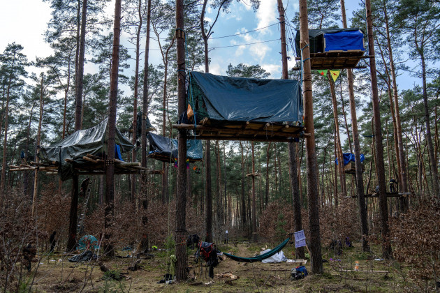 a-view-of-tree-houses-set-up-by-activists-near-the-tesla-gigafactory-for-electric-cars-in-gruenheide-near-berlin-germany-tuesday-march-5-2024-production-at-teslas-electric-vehicle-plant-in-germa
