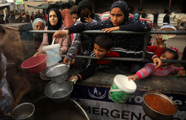 rafah-gaza-06th-mar-2024-palestinian-children-wait-to-receive-food-cooked-by-a-charity-kitchen-amid-shortages-of-food-supplies-in-rafah-in-the-southern-gaza-strip-wednesday-march-6-2024-food
