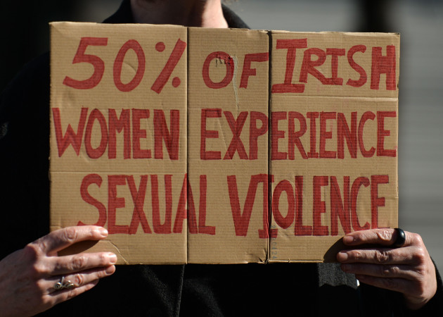 an-activist-holds-a-placard-reading-50-of-irish-women-experience-sexual-violence-during-a-solidarity-protest-with-women-in-the-uk-against-gender-based-violence-seen-on-oconnell-street-in-dublin-th