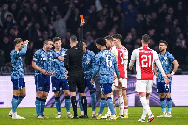 amsterdam-netherlands-07th-mar-2024-amsterdam-netherlands-march-7-referee-enea-jorgji-shows-a-red-card-to-ezri-konsa-of-aston-villa-fc-during-the-uefa-europa-conference-league-play-offs-match
