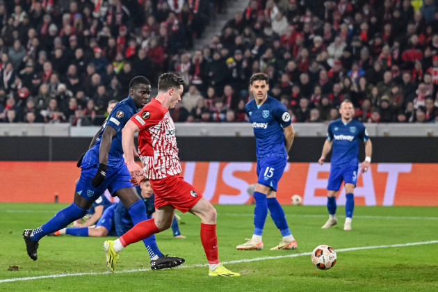 freiburgs-michael-gregoritsch-centre-left-scores-the-opening-goal-during-the-europa-league-round-of-16-first-leg-soccer-match-between-sc-freiburg-west-ham-united-at-the-europa-park-stadion-in-freib