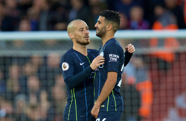 liverpool-8th-oct-2018-manchester-citys-david-silva-l-consoles-teammate-riyad-mahrez-who-missed-a-penalty-during-the-english-premier-league-match-between-liverpool-and-manchester-city-at-anfield