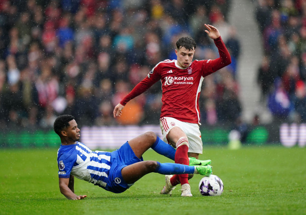 brighton-and-hove-albions-ansu-fati-left-and-nottingham-forests-neco-williams-battle-for-the-ball-during-the-premier-league-match-at-the-american-express-stadium-brighton-picture-date-sunday-ma
