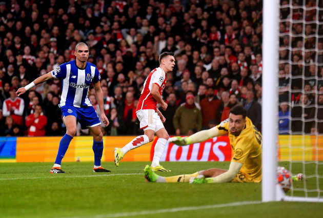 arsenals-leandro-trossard-scores-their-sides-first-goal-of-the-game-during-the-uefa-champions-league-round-of-16-second-leg-match-at-the-emirates-stadium-london-picture-date-tuesday-march-12-20