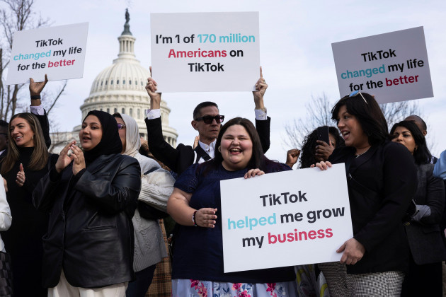 tiktok-users-rally-outside-the-u-s-capitol-ahead-of-a-house-vote-on-a-bill-that-could-result-in-a-u-s-ban-on-tiktok-over-national-security-concerns-march-13-2024-francis-chungpolitico-via-ap-ima
