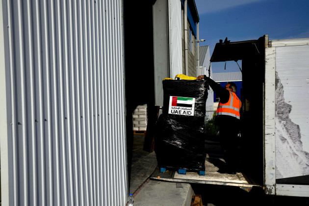 a-worker-use-a-lift-loading-humanitarian-aid-pallets-inside-a-truck-for-transport-to-the-port-of-larnaca-from-where-it-will-be-shipped-to-gaza-at-a-warehouse-near-larnaca-cyprus-on-wednesday-march
