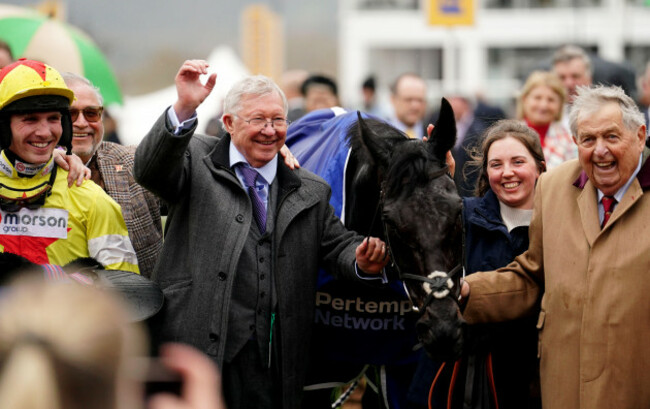 sir-alex-ferguson-centre-owner-of-monmiral-celebrates-after-watching-his-horse-win-the-pertemps-network-final-which-was-ridden-to-victory-by-harry-cobden-left-on-day-three-of-the-2024-cheltenham