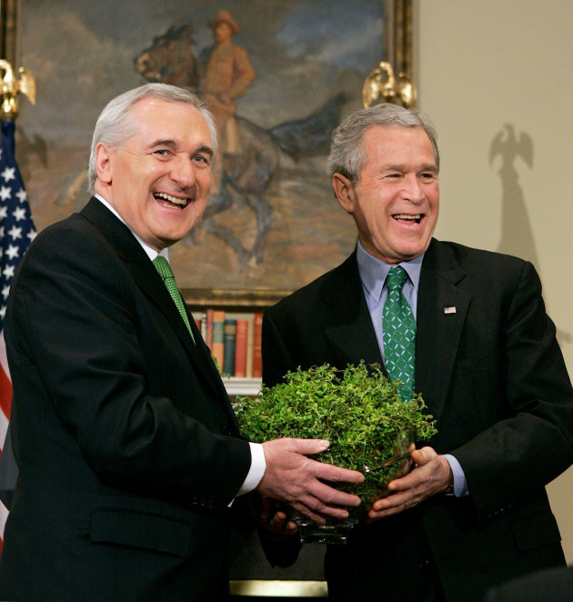 irelands-prime-minister-bertie-ahern-left-presents-a-bowl-of-shamrock-to-president-bush-during-a-saint-patricks-day-celebration-in-the-roosevelt-room-of-the-white-house-in-washington-thursday-ma