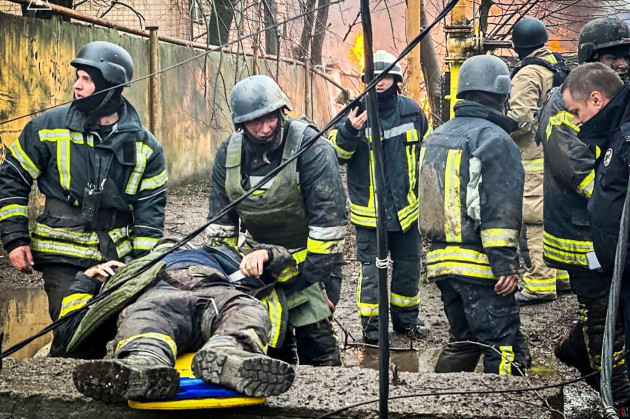 in-this-photo-provided-by-the-ukrainian-emergency-service-emergency-services-help-their-comrade-injured-during-a-russian-attack-in-odesa-ukraine-friday-march-15-2024-a-russian-missile-strike-on
