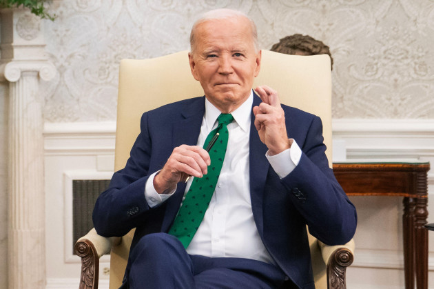 washington-united-states-15th-mar-2024-u-s-president-joe-biden-meet-reacts-to-a-reporters-question-during-a-meeting-with-irelands-taoiseach-leo-varadkar-in-the-oval-office-at-the-white-house-in