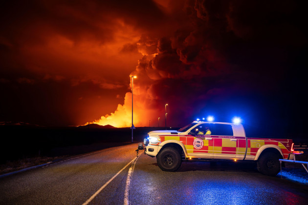 an-emergency-vehicle-is-stationed-on-a-road-leading-to-volcanic-activity-between-hagafell-and-stori-skogfell-iceland-on-saturday-march-16-2024-ap-photomarco-di-marco