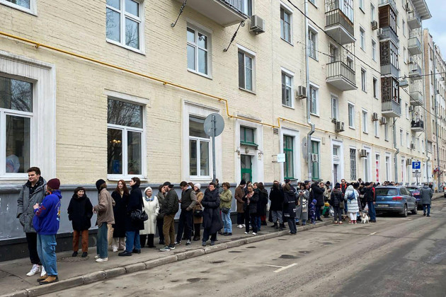voters-queue-at-a-polling-station-in-moscow-russia-at-noon-local-time-on-sunday-march-17-2024-the-russian-opposition-has-called-on-people-to-head-to-polling-stations-at-noon-on-sunday-in-protest