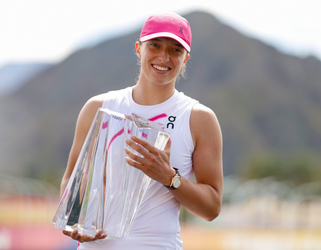 march-17-2024-iga-swiatek-of-poland-holds-her-winners-trophy-after-her-straight-sets-victory-against-maria-sakkari-of-greece-in-the-womens-final-during-the-bnp-paribas-open-at-indian-wells-tennis-ga