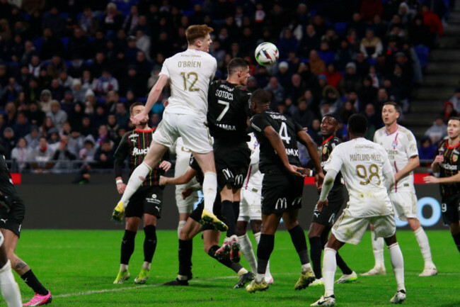 jake-obrien-of-lyon-and-florian-sotoca-of-lens-during-the-french-championship-ligue-1-football-match-between-olympique-lyonnais-and-rc-lens-on-march-3-2024-at-groupama-stadium-in-decines-charpieu-ne