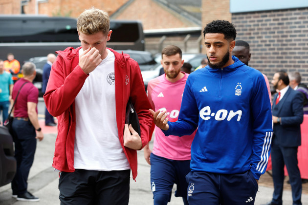 brentfords-nathan-collins-and-nottinaghm-forests-andrew-omobamidele-arrive-for-during-the-premier-league-match-at-city-ground-nottingham-picture-date-sunday-october-1-2023