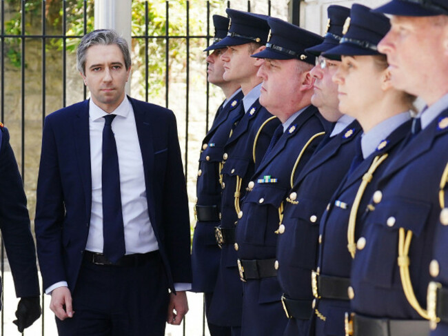 minister-for-justice-simon-harris-left-arriving-for-a-ceremony-to-award-deceased-retired-and-serving-members-of-an-garda-siochana-with-bravery-medals-at-walter-scott-house-military-road-dublin-p