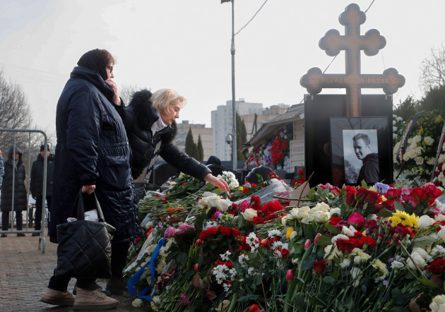 adds-name-of-navalnys-mother-in-law-russian-opposition-leader-alexei-navalnys-mother-lyudmila-navalnaya-left-and-his-mother-in-law-alla-abrosimova-visit-the-grave-of-alexei-navalny-after-his-ye