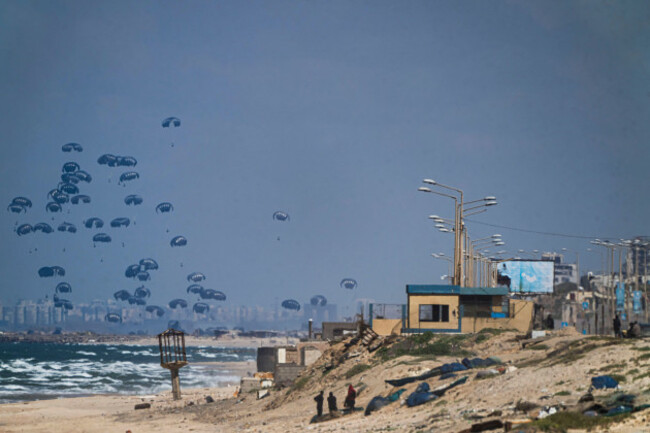 an-aircraft-airdrops-humanitarian-aid-over-the-northern-gaza-strip-as-seen-from-central-gaza-monday-march-25-2024-ap-photofatima-shbair