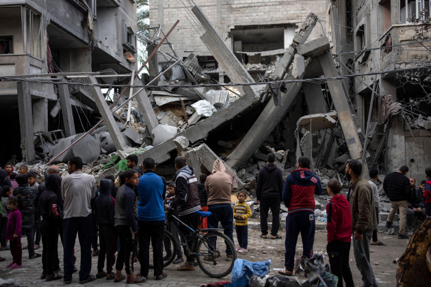 palestinians-inspect-the-damage-of-residential-buildings-after-an-israeli-airstrike-in-rafah-southern-gaza-strip-sunday-march-24-2024-ap-photofatima-shbair